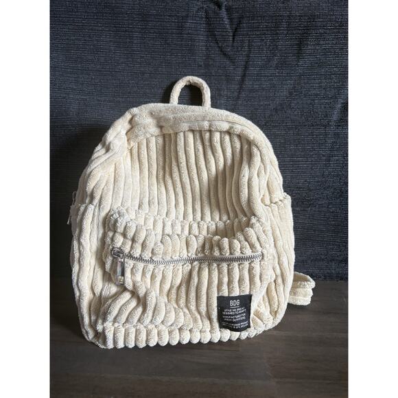 Urban Outfitters Handbags - Urban Outfitters BDG Wide Wale Corduroy Soft Mini Backpack White EUC